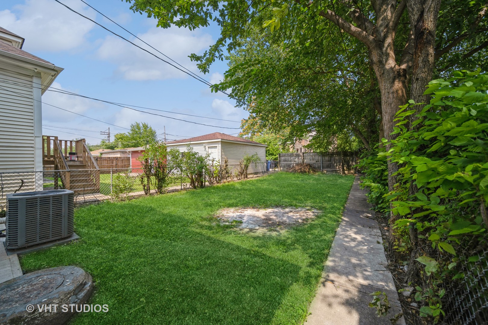 552 East 91st Place Chicago, IL 60619 - Photo 17 of 17 a view of backyard of house with green space