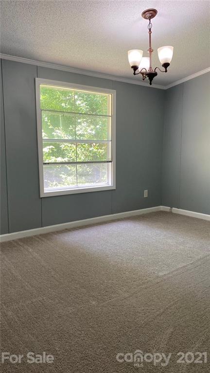 2811 Price Rushing Road Monroe, NC 28110 - Photo 22 of 34 a view of an empty room with a window