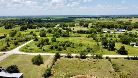 a view of a lot of trees and houses