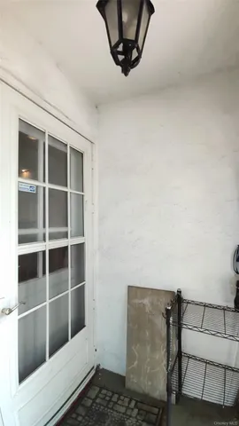 a view of a house with garden and backyard