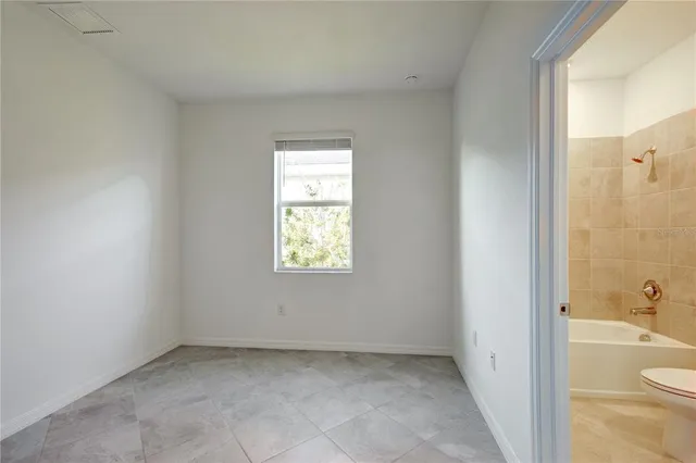 an empty room with a window