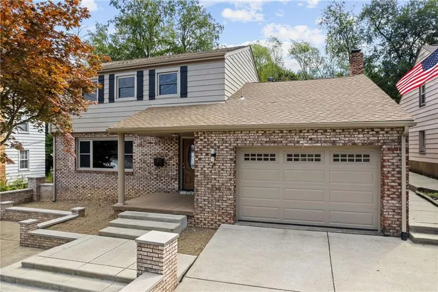 a view of a house with a garage