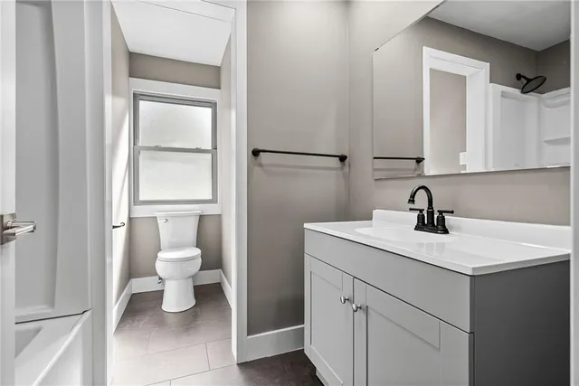a view of a bathroom with a sink and a toilet