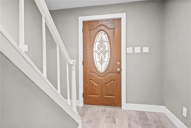 a view of a hallway with entryway