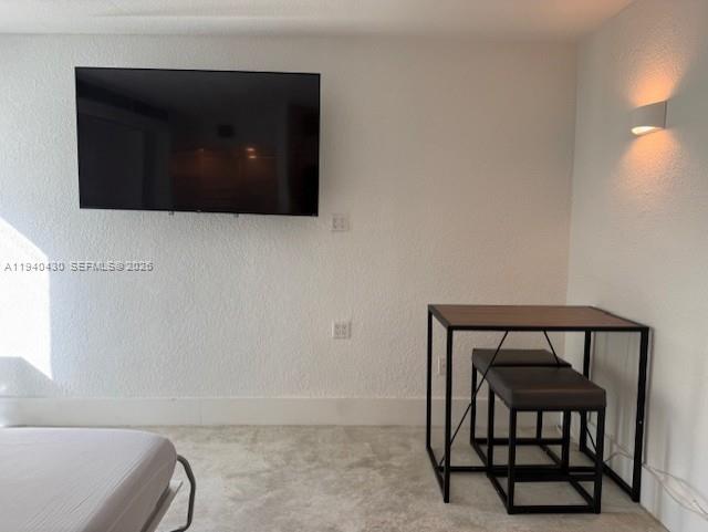 150 Southwest 10th Street, Unit 7 Miami, FL 33130 - Photo 7 of 15 a bathroom with a toilet and a sink