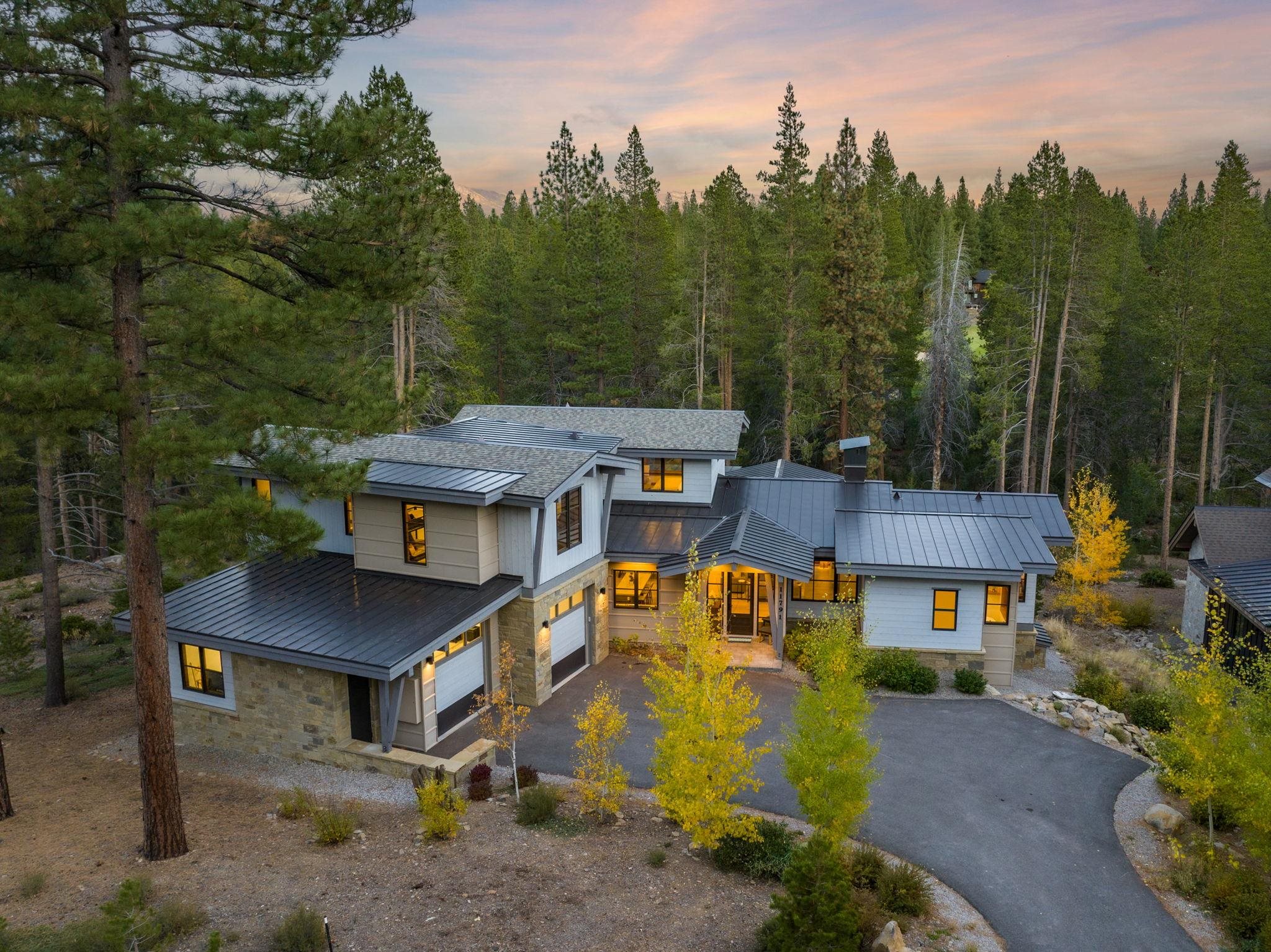 11791 Ghirard Road Truckee, CA 96161 - Photo 1 of 28 an aerial view of a house with garden space and a car park