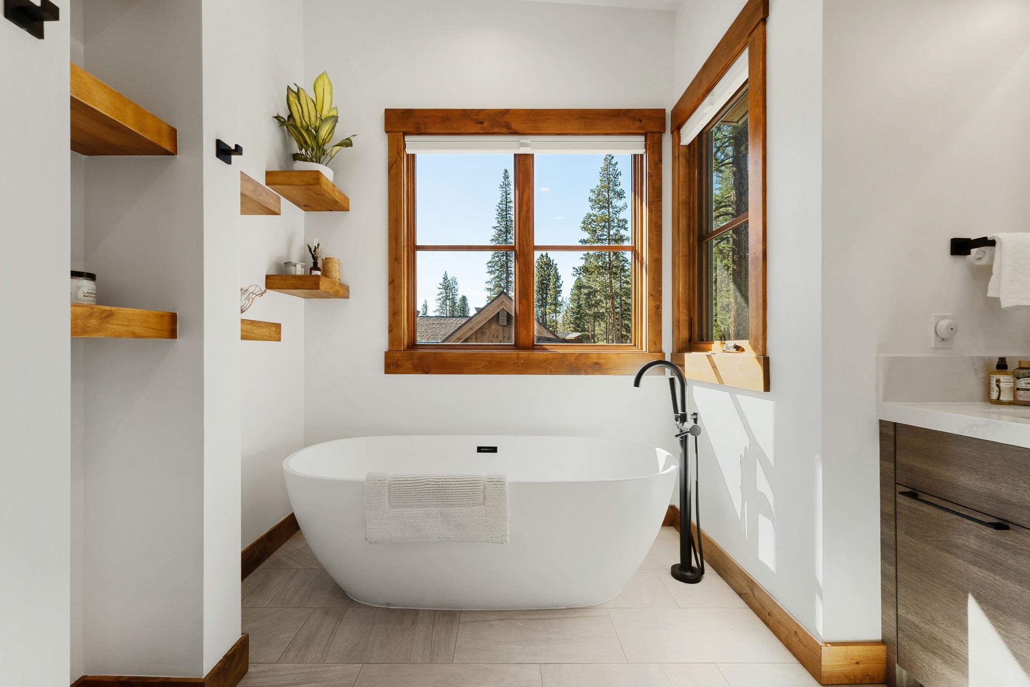 11791 Ghirard Road Truckee, CA 96161 - Photo 25 of 28 a white bath tub sitting next to a bathroom
