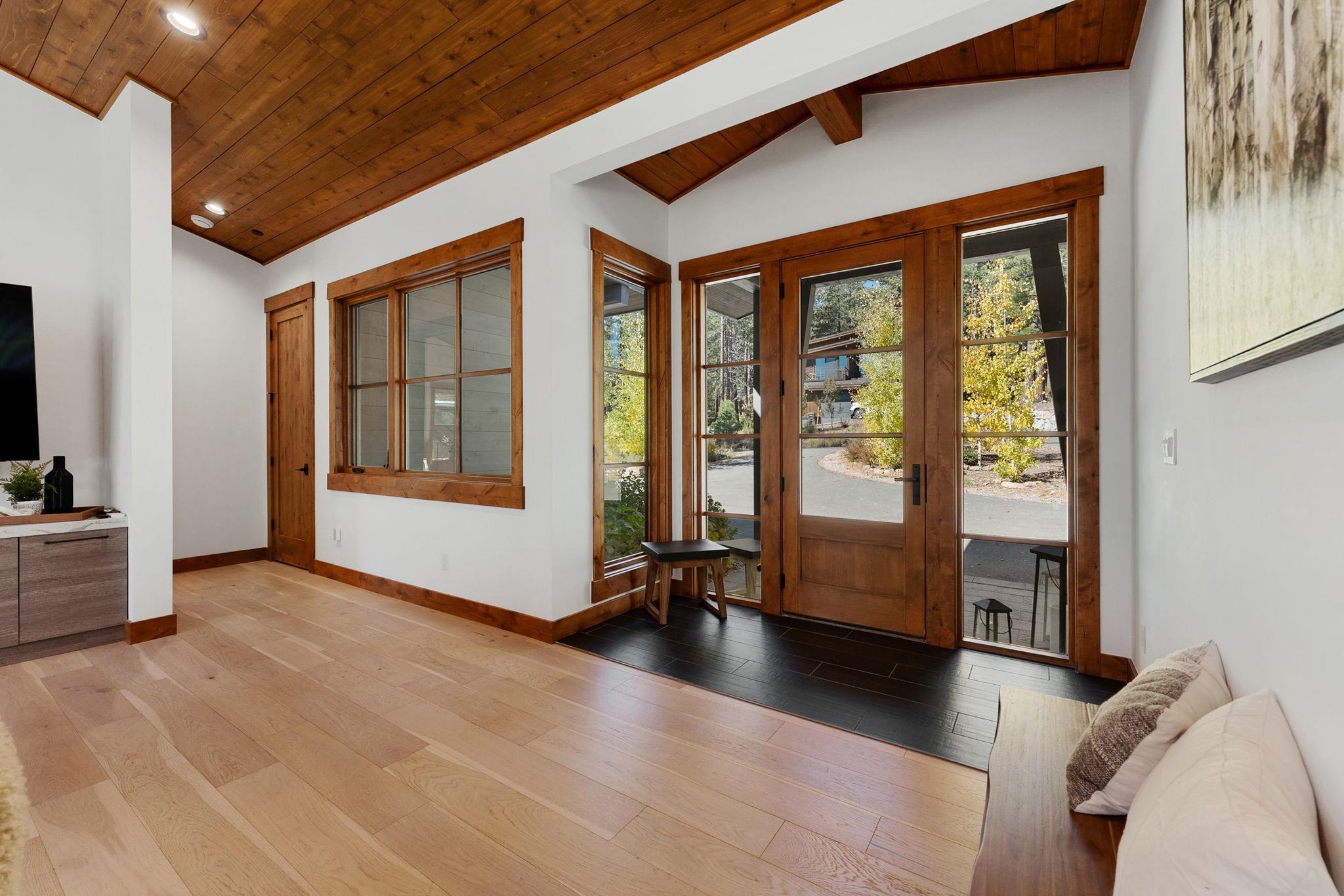 11791 Ghirard Road Truckee, CA 96161 - Photo 6 of 28 a view of a livingroom with furniture and floor to ceiling window