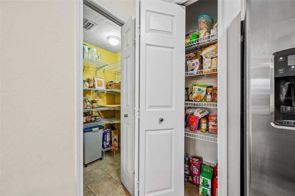 11550 Northwest 17 Place Gainesville, FL 32606 - Photo 12 of 48 a room with storage and utility