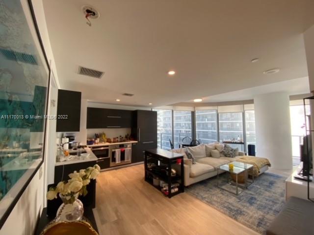 Brickell Heights II Miami, FL 33130 - Photo 11 of 12 a living room with furniture large window and a table