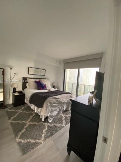 Brickell Heights II Miami, FL 33130 - Photo 5 of 12 a bedroom with a bed and a window