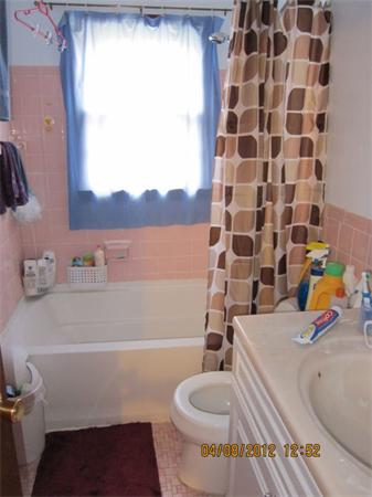 7 Raechel Road, Unit 7 Randolph, MA 02368 - Photo 3 of 23 a bathroom with a sink toilet and shower
