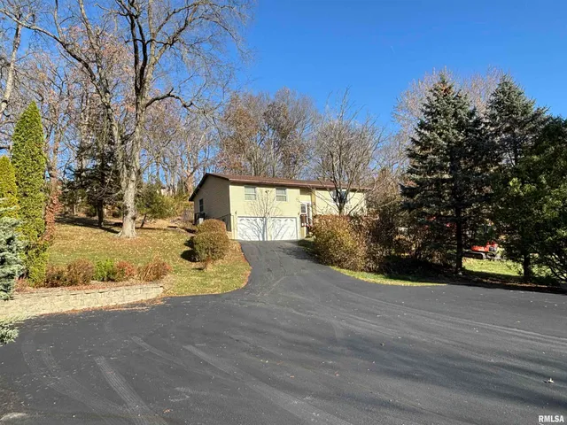 $320,000 | 61 West Timberline Drive, Blue Grass, IA 52726