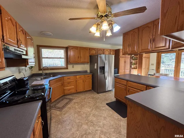 $320,000 | 61 West Timberline Drive, Blue Grass, IA 52726