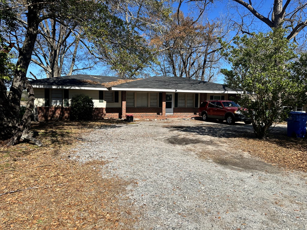 5926 Frazier Drive Columbus, GA 31909 - Photo 12 of 18 a view of a house with a yard covered in snow