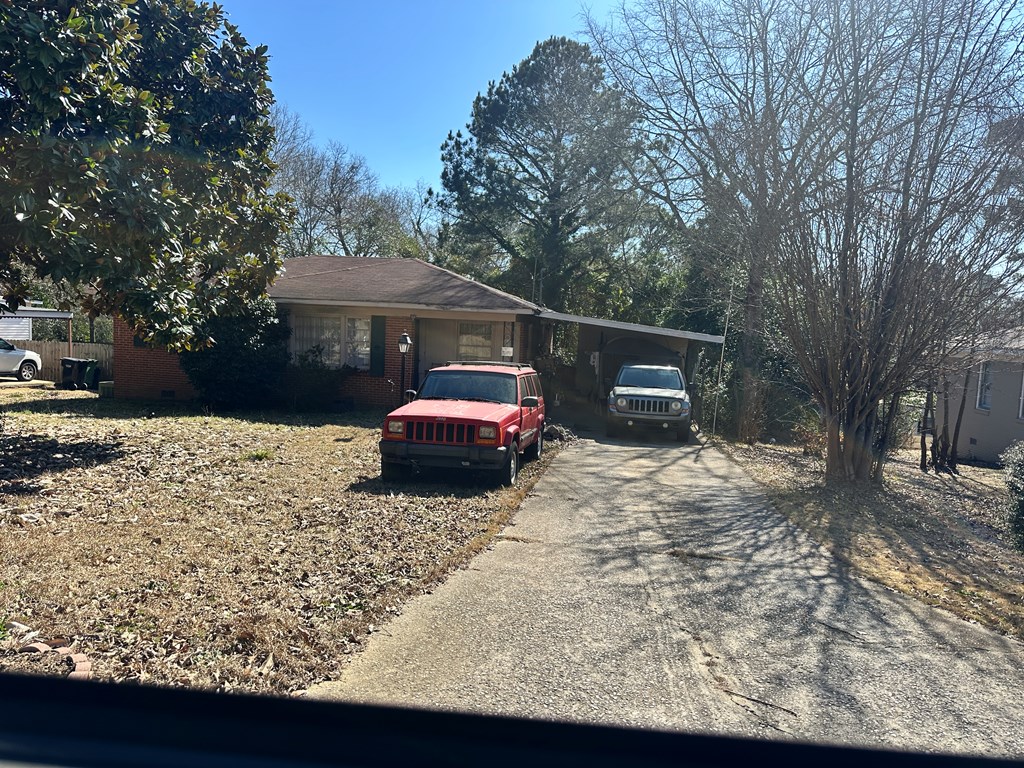 5926 Frazier Drive Columbus, GA 31909 - Photo 14 of 18 a view of a backyard with a sitting area