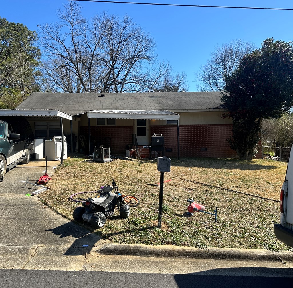 5926 Frazier Drive Columbus, GA 31909 - Photo 16 of 18 a view of a yard with plants