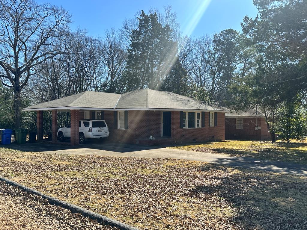 5926 Frazier Drive Columbus, GA 31909 - Photo 18 of 18 a front view of a house with a yard