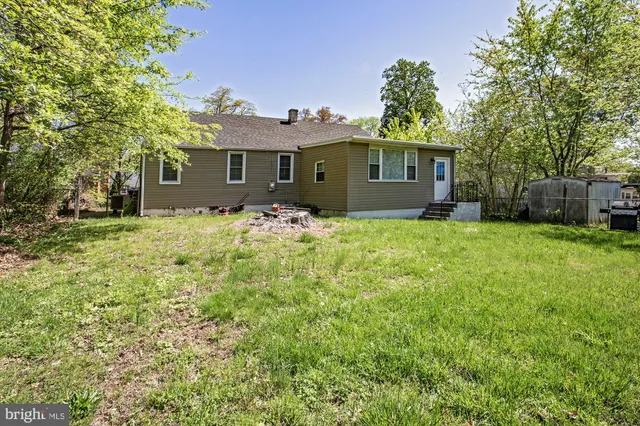 a front view of a house with yard