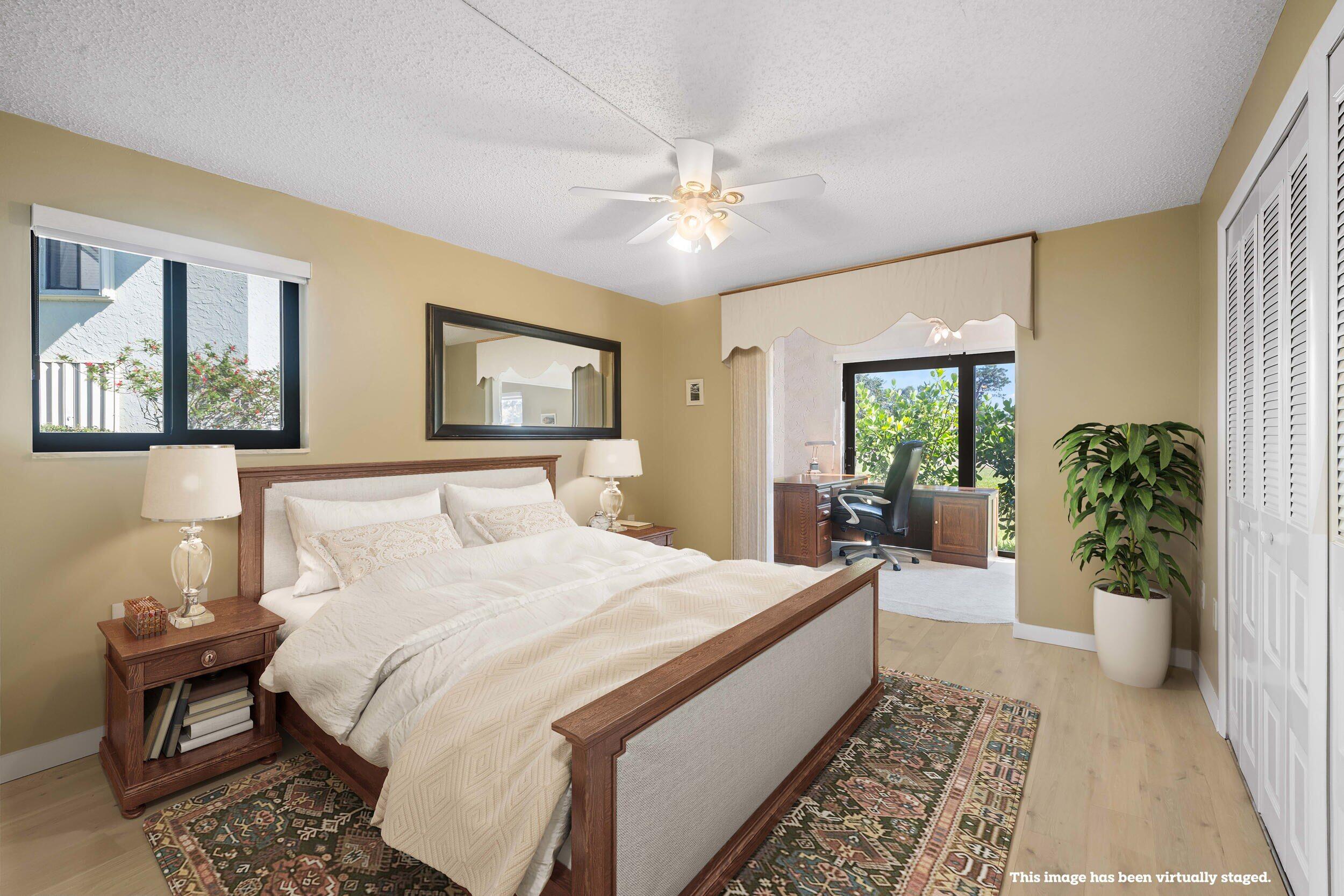 5443 Southeast Miles Grant Road, Unit D101 Stuart, FL 34997 - Photo 13 of 21 2nd Bedroom (virtually staged)