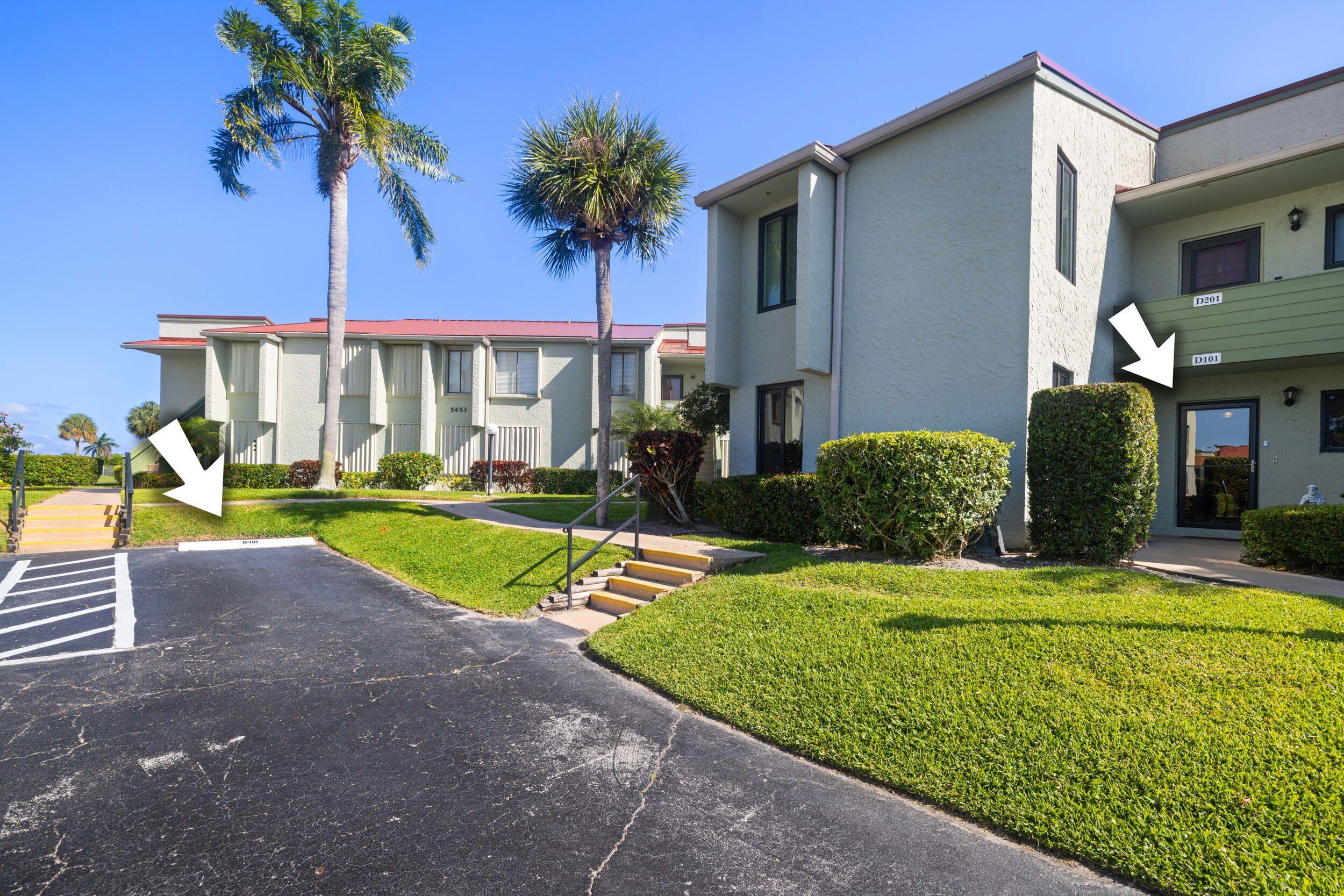5443 Southeast Miles Grant Road, Unit D101 Stuart, FL 34997 - Photo 17 of 21 Assigned parking