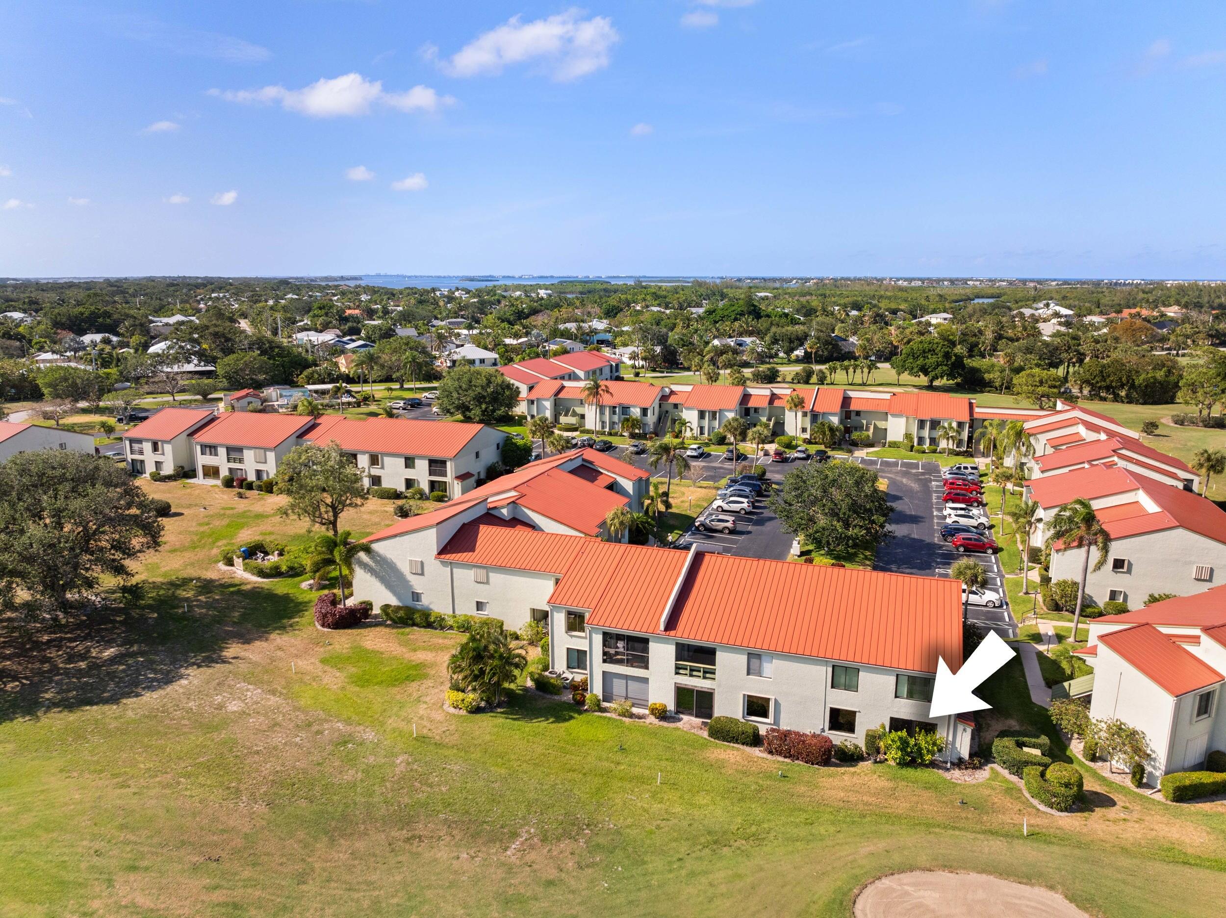 5443 Southeast Miles Grant Road, Unit D101 Stuart, FL 34997 - Photo 21 of 21 Aerial rear location