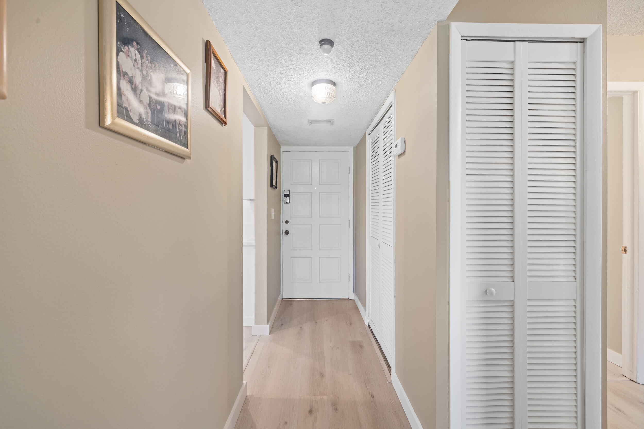 5443 Southeast Miles Grant Road, Unit D101 Stuart, FL 34997 - Photo 9 of 21 Hallway