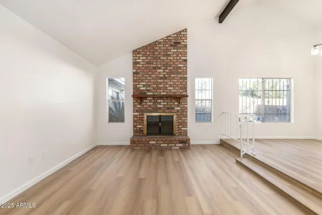 an empty room with windows