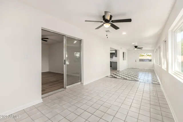 a view of an empty room and window