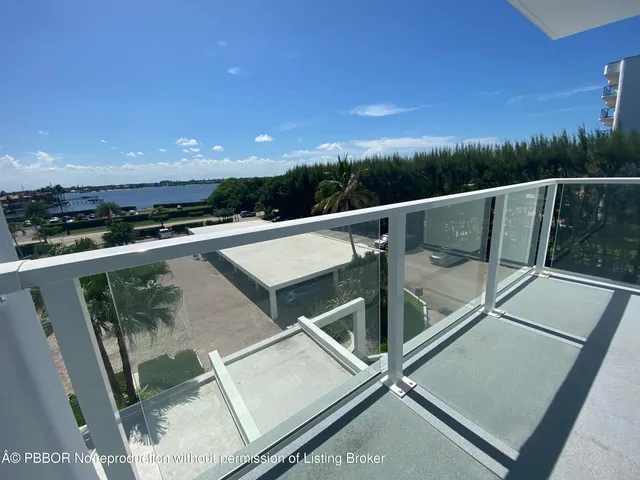 a view of balcony with furniture