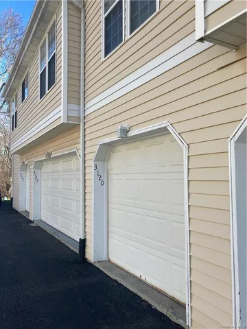 a view of a house with a garage