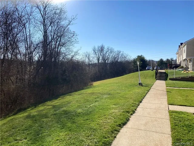 a view of a garden with a pathway