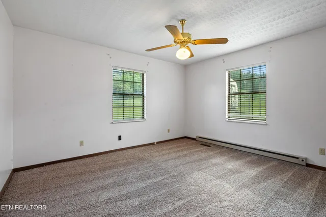 an empty room with windows