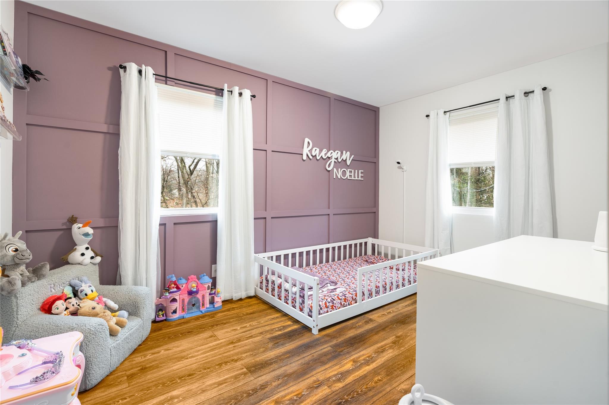 45 Raker Road Poughkeepsie, NY 12603 - Photo 15 of 25 Bedroom featuring a decorative wall and wood finished floors