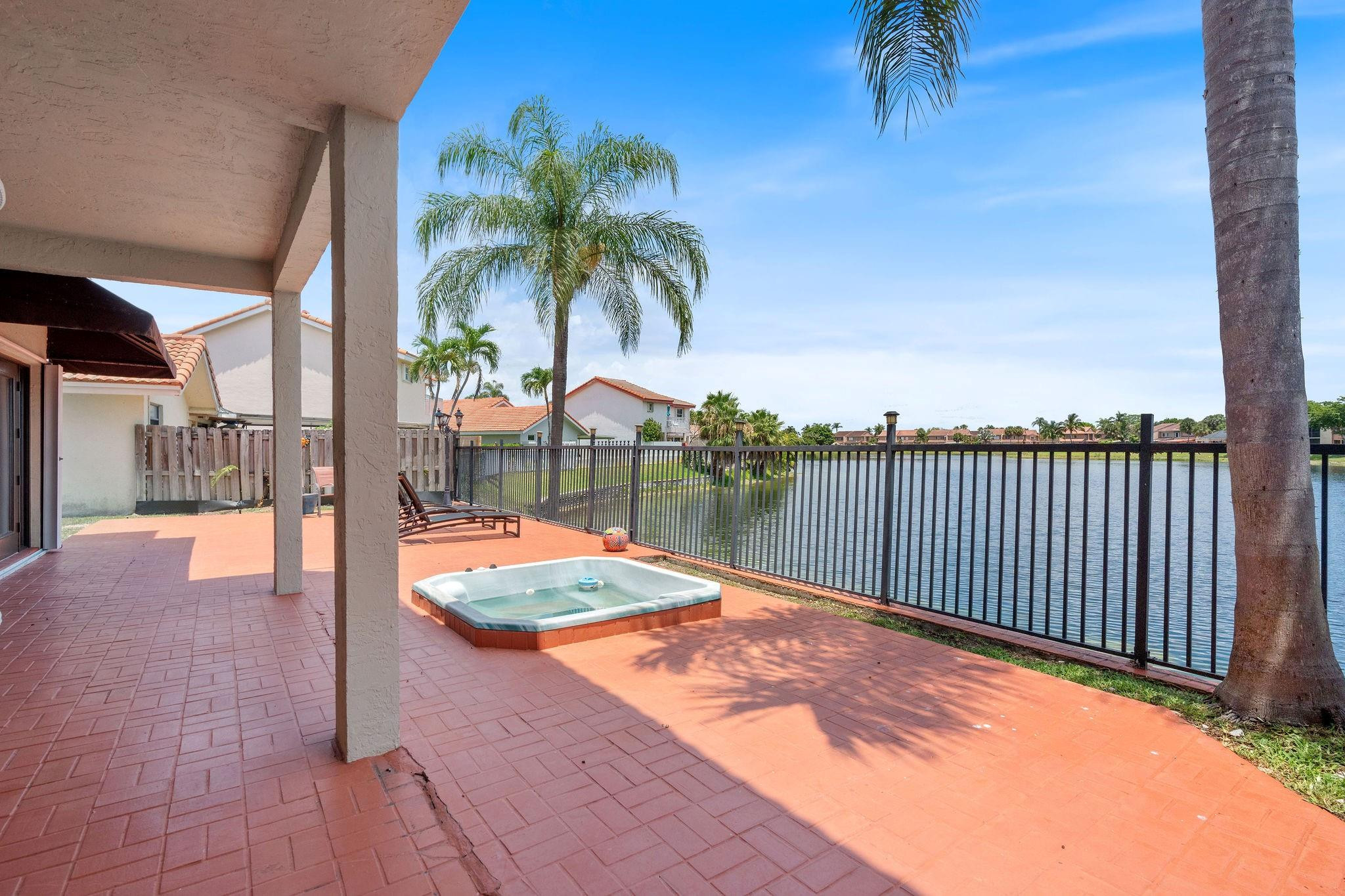8313 Northwest 188th Terrace Hialeah, FL 33015 - Photo 46 of 50 a outdoor view with a backyard
