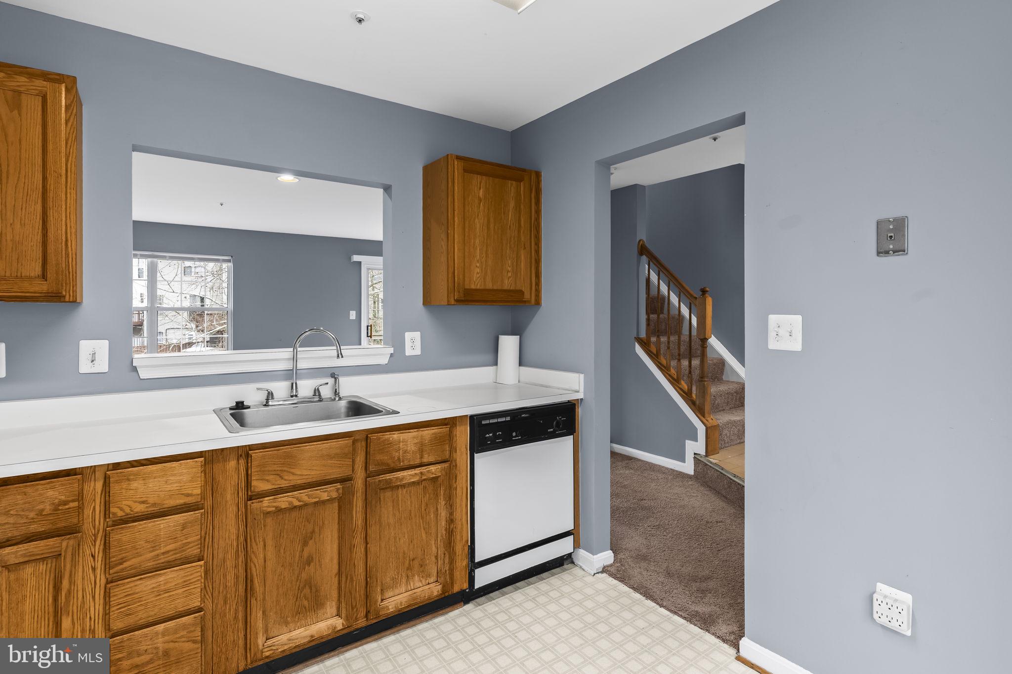 13192 Ripon Place Upper Marlboro, MD 20772 - Photo 4 of 23 a bathroom with a double vanity sink and a mirror