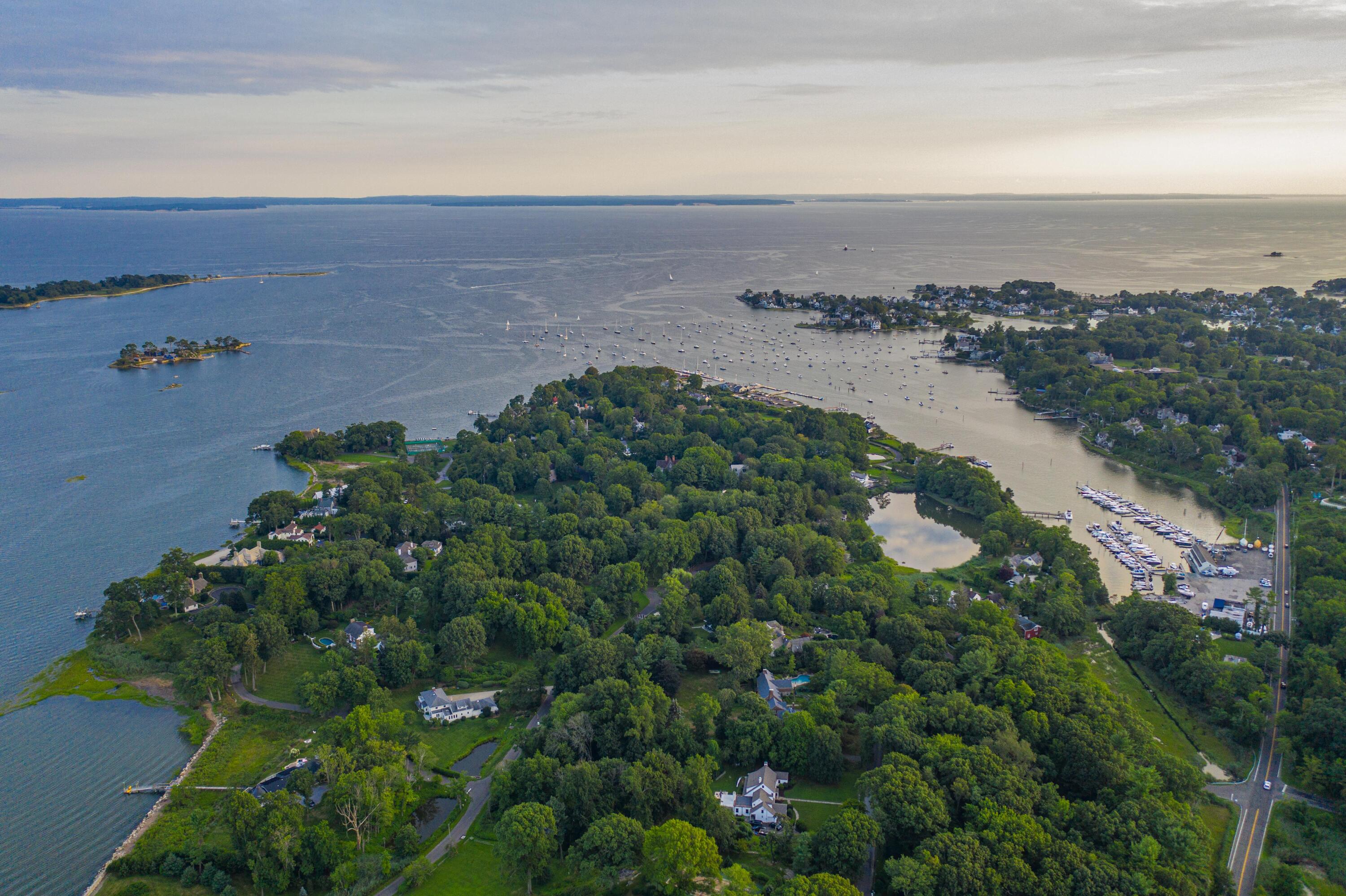 3 Hilltop Road, Unit 1 Norwalk, CT 06854 - Photo 1 of 11 an aerial view of residential building and green space