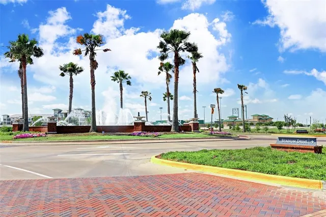 a view of a yard with cars parked