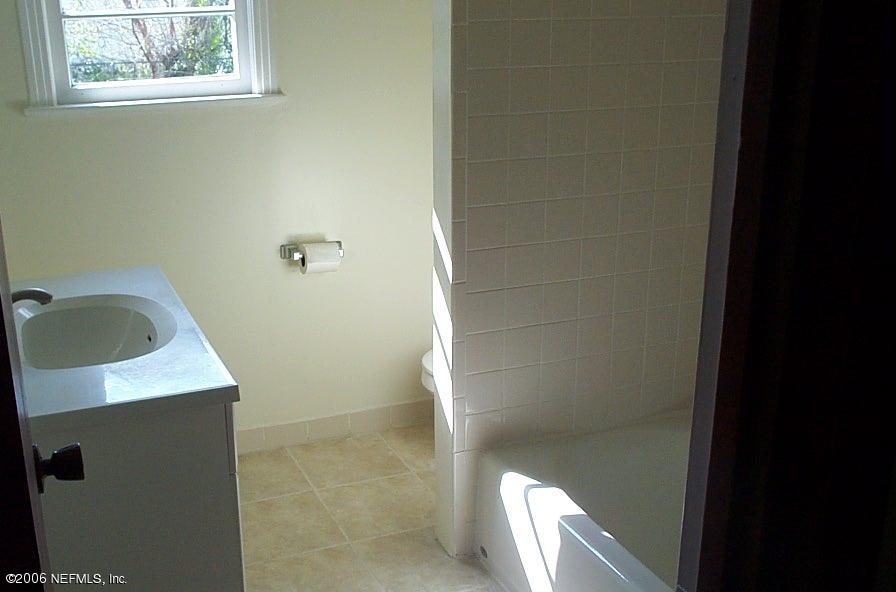 6524 Brandemere Road South Jacksonville, FL 32211 - Photo 2 of 4 a bathroom with a sink and vanity