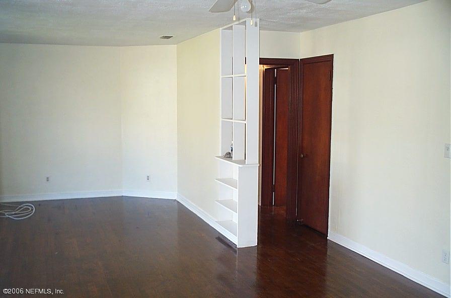 6524 Brandemere Road South Jacksonville, FL 32211 - Photo 4 of 4 an empty room with wooden floor