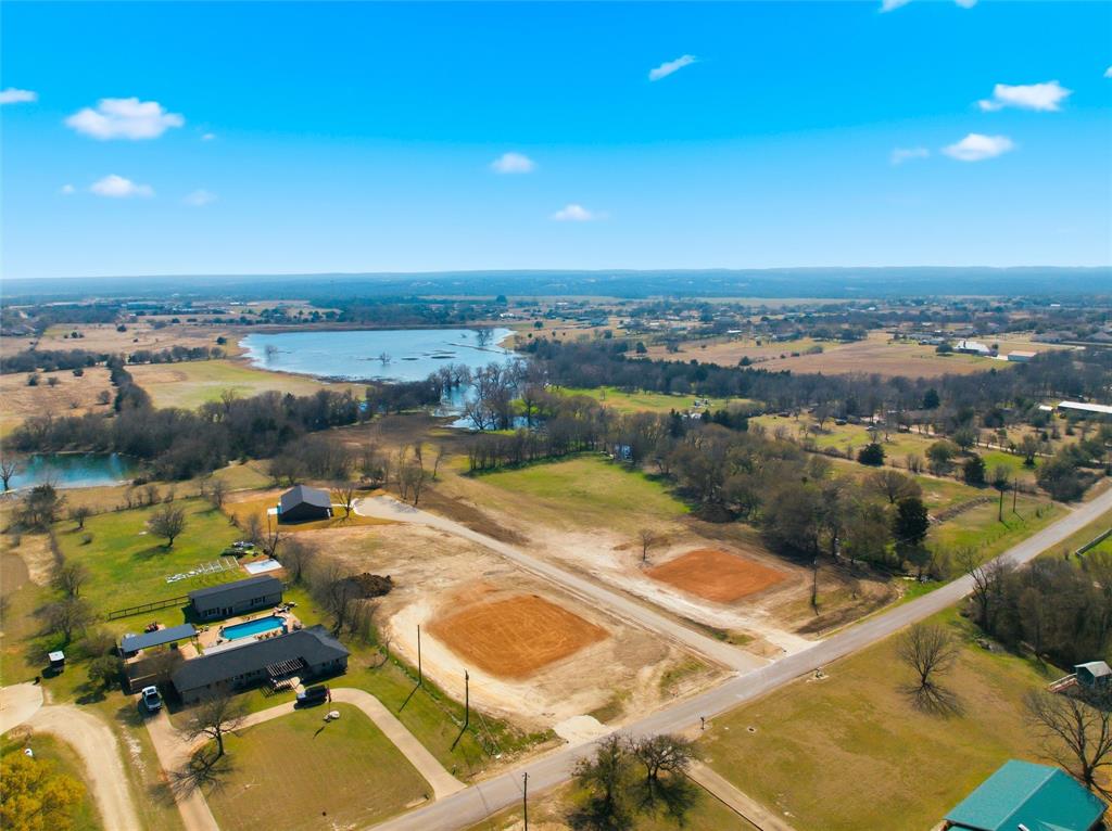2303 Pilgrim Lane Lorena, TX 76655 - Photo 38 of 38 an aerial view of a house with a swimming pool