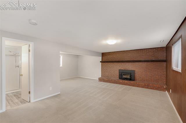 4095 Hollow Road Colorado Springs, CO 80917 - Photo 22 of 41 Family Room and new Wood Fireplace insert