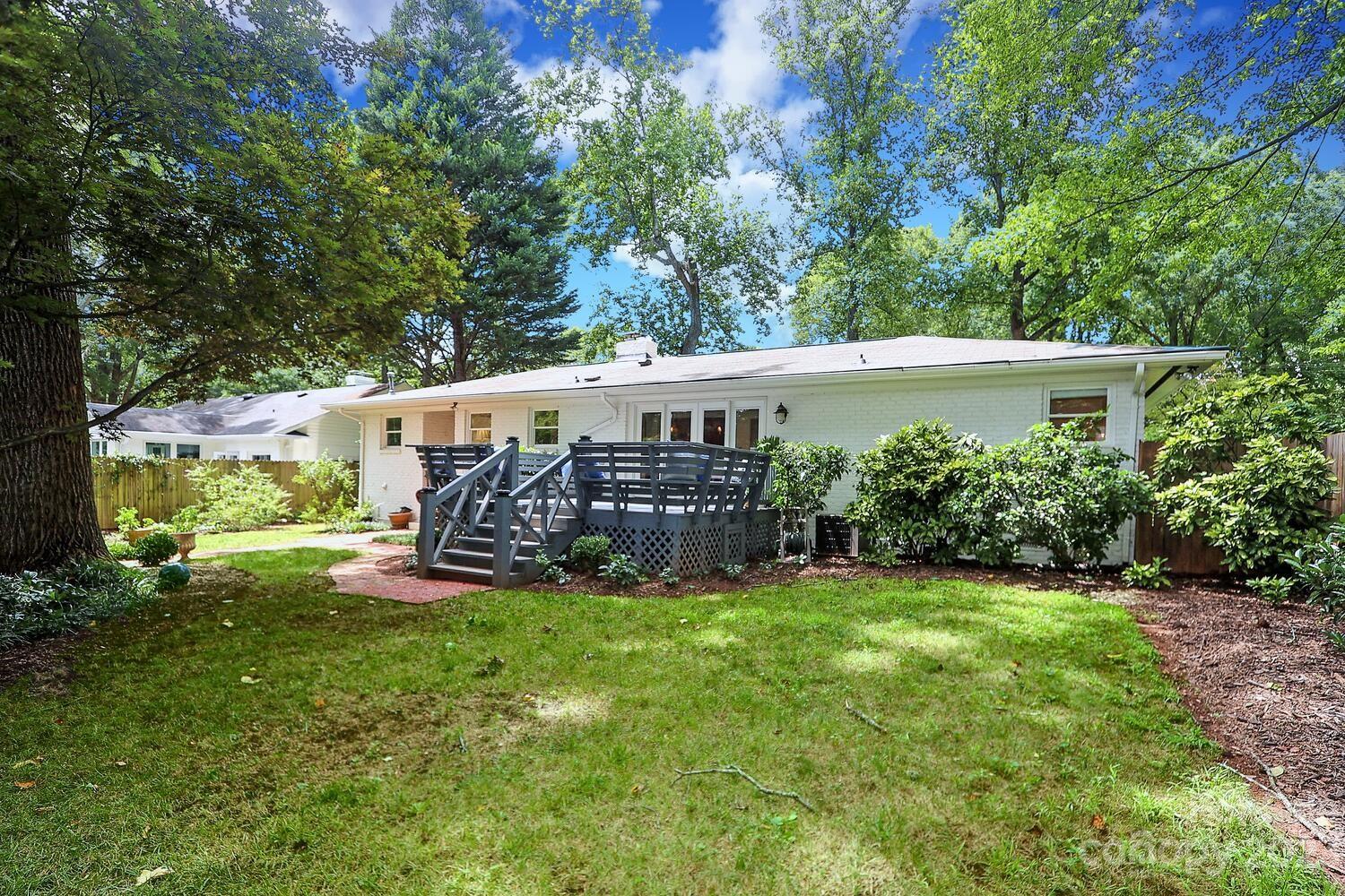 5529 Seacroft Road Charlotte, NC 28210 - Photo 14 of 14 a view of a house with backyard and a tree