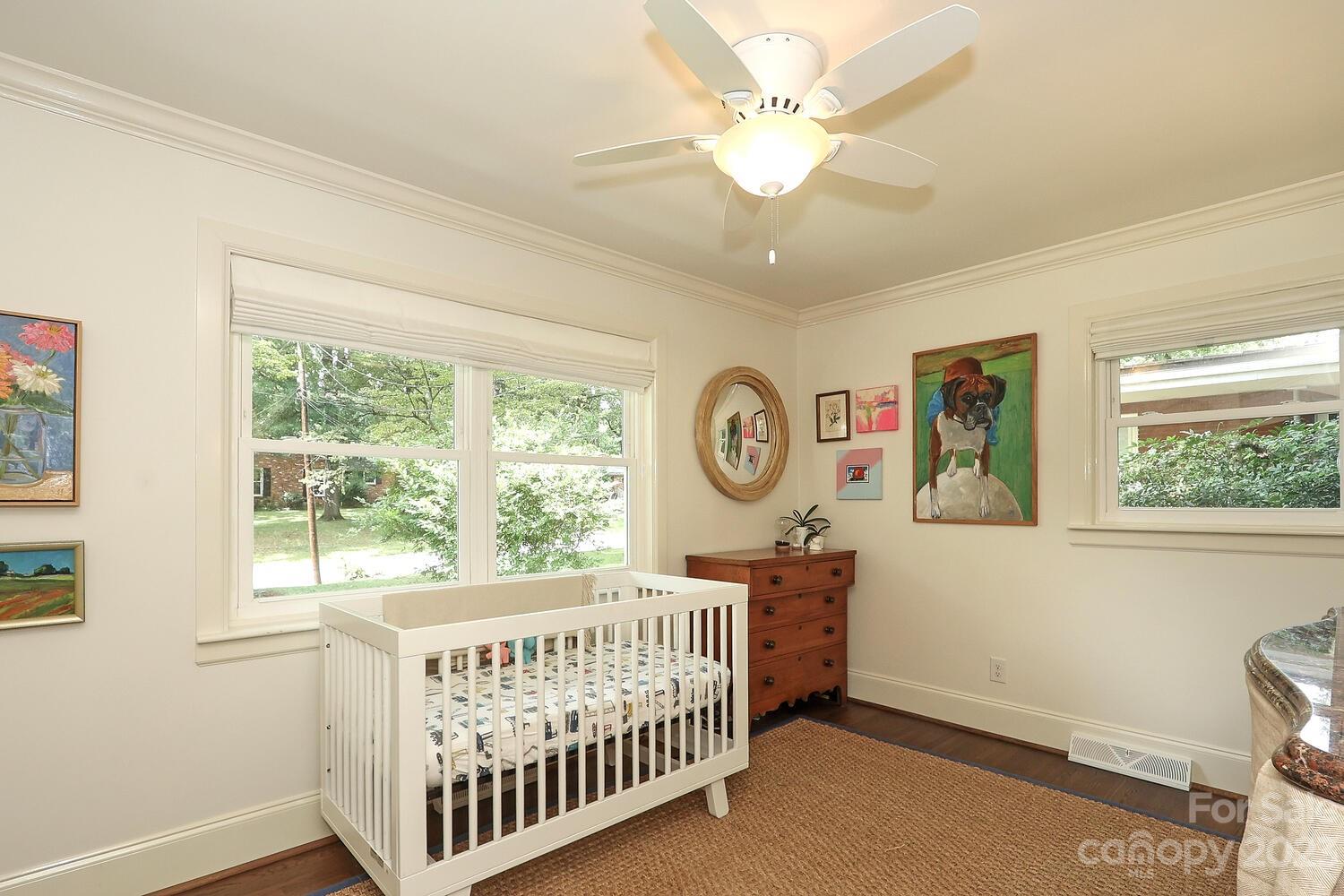5529 Seacroft Road Charlotte, NC 28210 - Photo 10 of 14 a bedroom with furniture and a large window