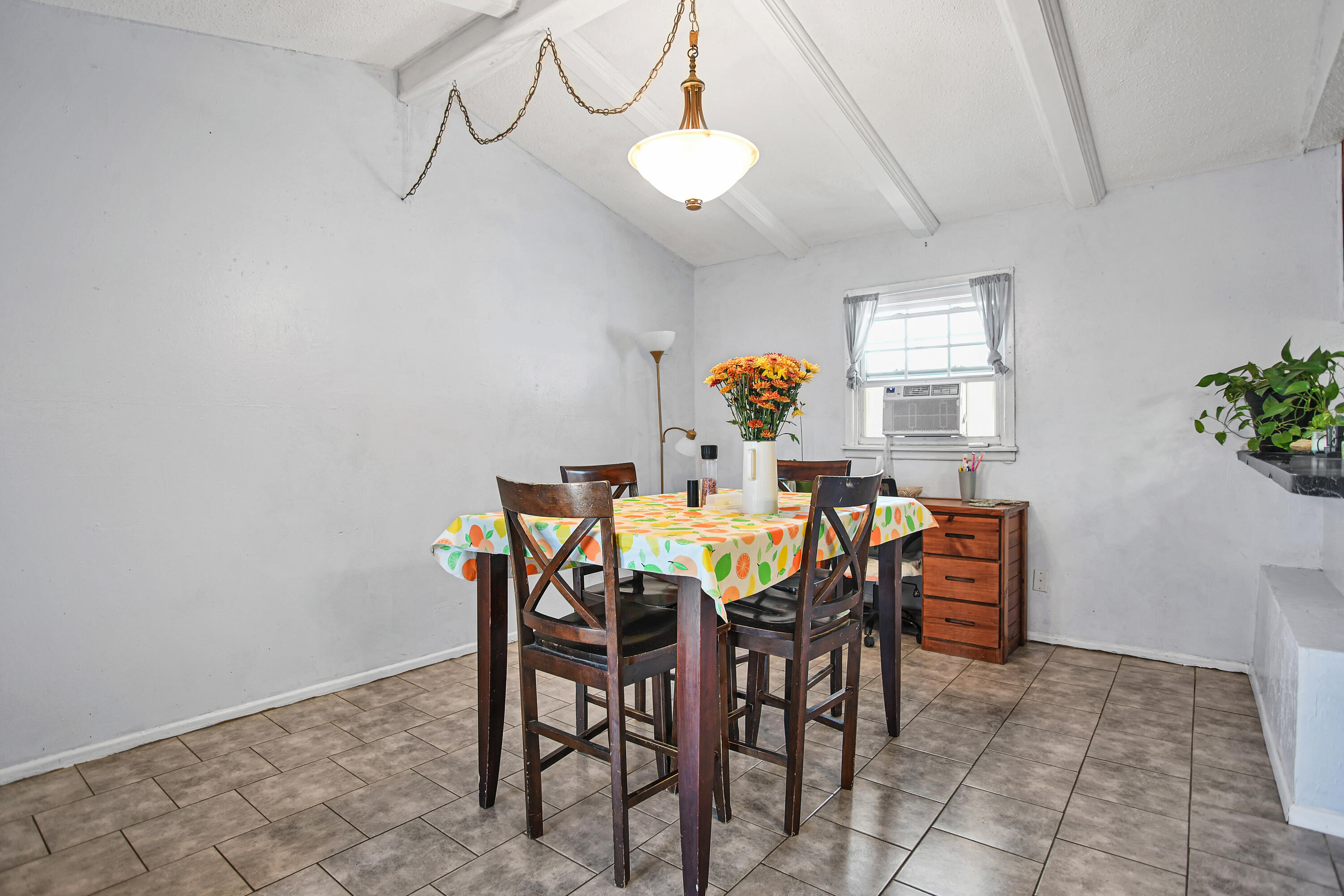 1810 East Colgate Street Lubbock, TX 79403 - Photo 16 of 40 a view of a dining room with furniture and wooden floor