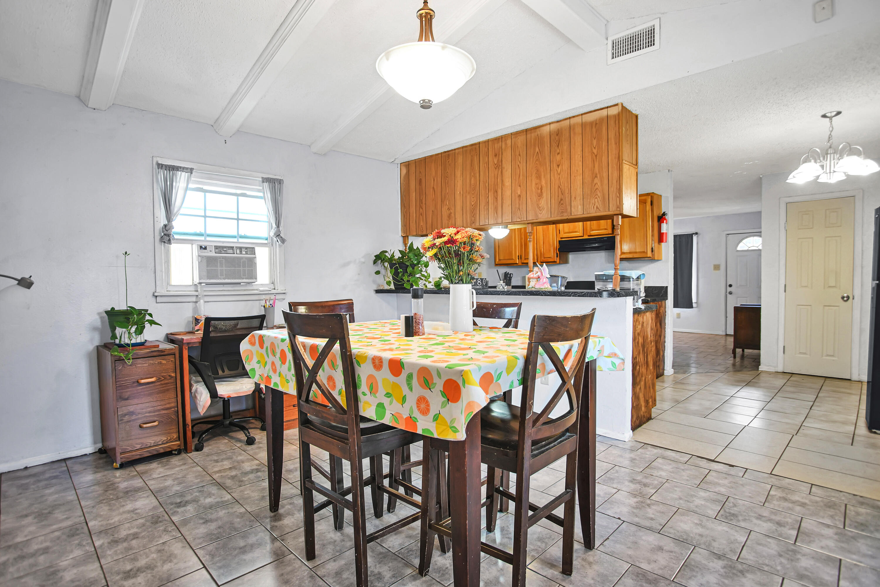 1810 East Colgate Street Lubbock, TX 79403 - Photo 17 of 40 a dining room with furniture and window