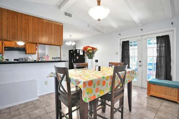 a view of a dining room with furniture
