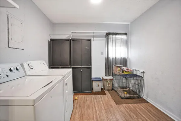 a view of bathroom with washer and dryer