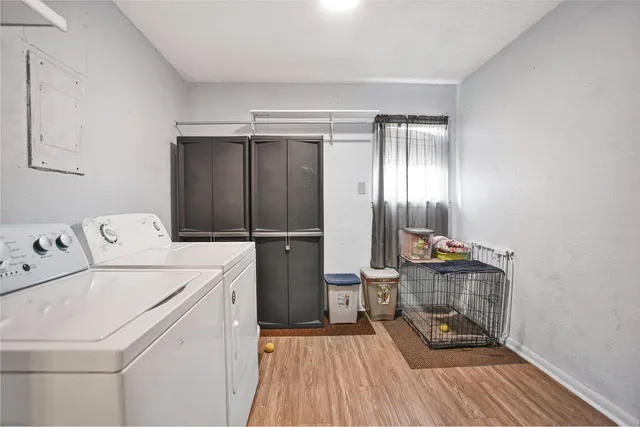 a view of bathroom with washer and dryer