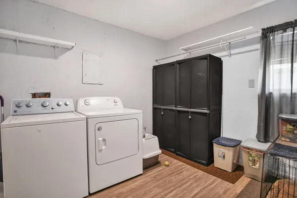 a utility room with dryer and washer